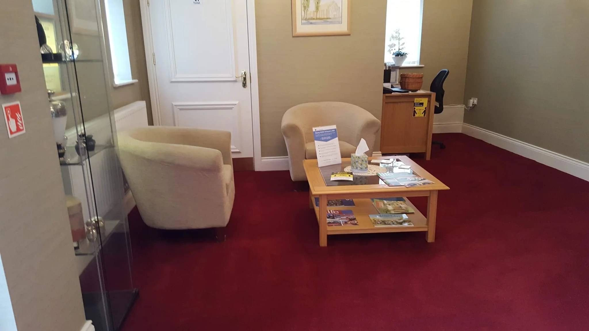 Clean red carpet in a professional waiting room